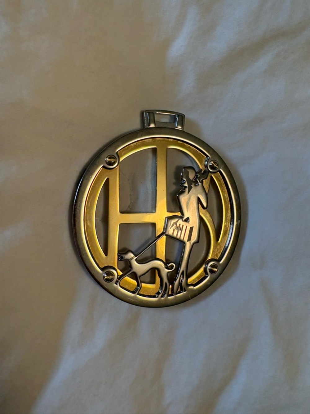 Henry bendel Two-Tone Gold and Silver Round Key Charm with Woman & Dog Motif